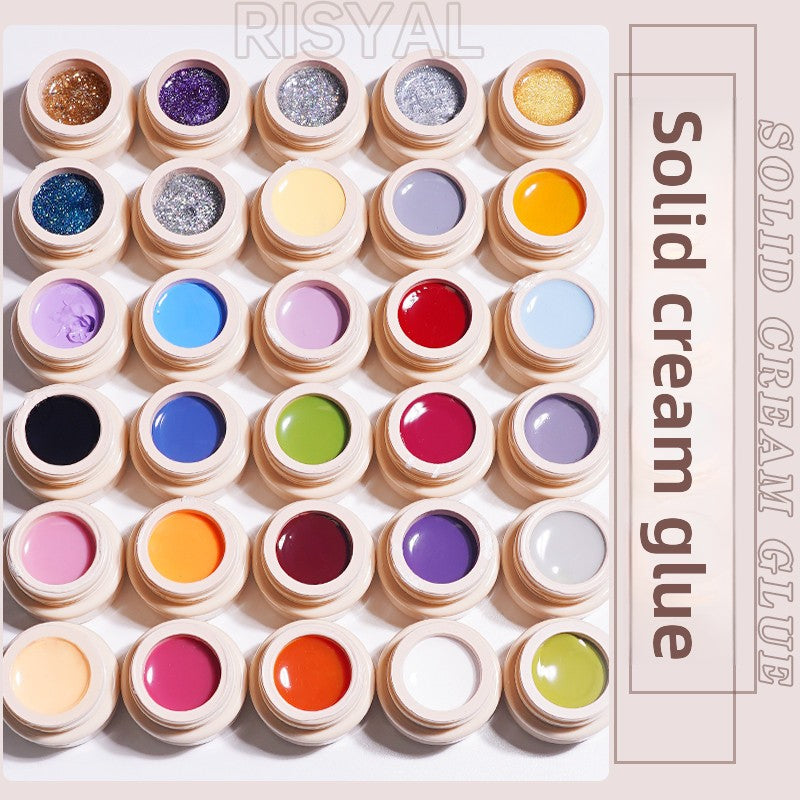 Solid nail polish glue set with assorted glitter pots: purple, gold, blue, silver, black