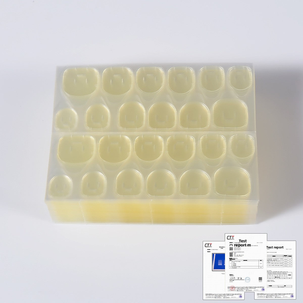 Light yellow press-on nail tips shown in sealed organizer tray