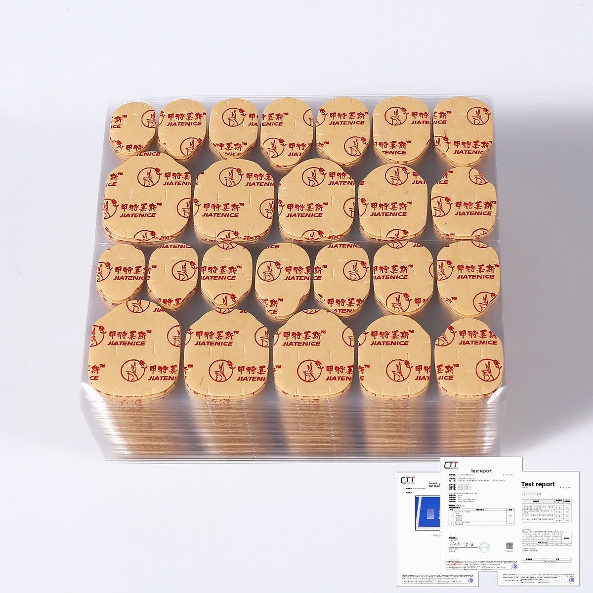 Nail adhesive jelly pads in clear tray, beige tabs with red logo text